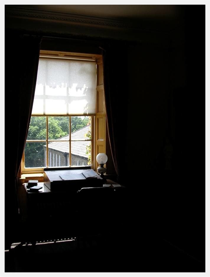 an open window above a desk in ireland